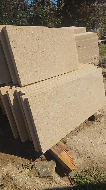 perde karnizleri: Təbii daşdan dekorativ fasad elementləri və qopqalar - Material — 2