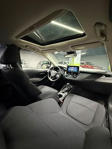byd e3: Toyota Corolla: 2020 г., 1.8 л, Автомат, Гибрид, Седан — 6