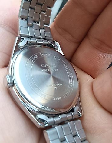 5 15: Casio kişi qol saatı - Model: MTP seriyası (arxa qapaqda MTP-1383 — 4