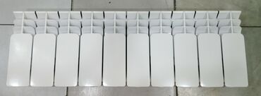 hamam qaplari: Ağ rəngli bölməli radiator paneli (seksiyalı). Xüsusiyyətlər: - 10