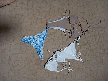 Kupaći kostimi: Ženski kupaći kostimi – set više modela - Jednodelni beli sa natpisom — 10