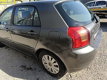 terrano 2: Toyota Corolla: 2003 г., 1.6 л, Механика, Бензин, Хэтчбэк — 4