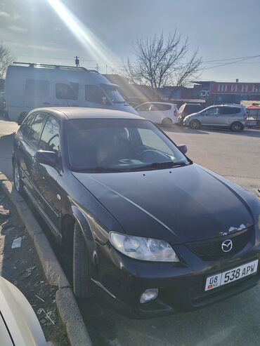 наварка шин: Mazda 323: 2001 г., 2 л, Механика, Бензин, Хетчбек