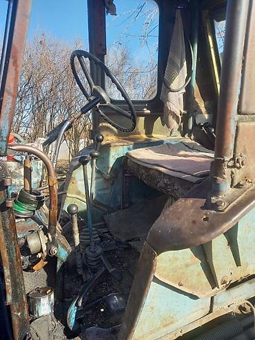 Ekskavatorlar: Ekskavator-yükleyici (traktor bazalı) – ön bıçaq və arxa ekskavator — 6