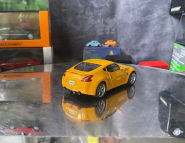 Avtomobil modelləri: Коллекционная модель Nissan 370Z Z34 yellow 2008 DeAgostini Scale — 6