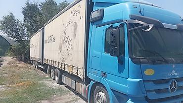 танден: Тягач, Mercedes-Benz, 2010 г., Тентованный — 1