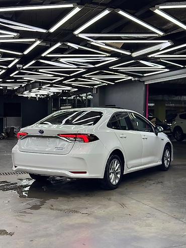 voxy noah: Toyota Corolla: 2022 г., 1.8 л, Автомат, Гибрид, Седан — 4