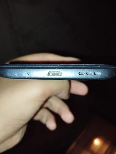Xiaomi Redmi 10A, 32 ГБ, цвет - Черный, 
 Кнопочный, Отпечаток пальца, Две SIM карты