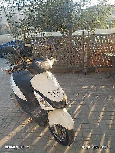 elektrikli scooter en ucuz: Skuter – şəhər içi gediş‑gəliş və çatdırılma üçün praktik model - — 4