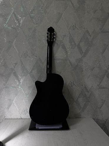 Klassik gitaralar: Klasik akustik gitara – kəsik (cutaway) korpuslu, qara rəng Qeyd: - — 3