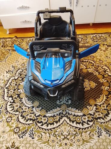 детские мотоциклы на аккумуляторе: Uşaq üçün elektrikli minik avtomobili – off-road tipli, mavi-qara