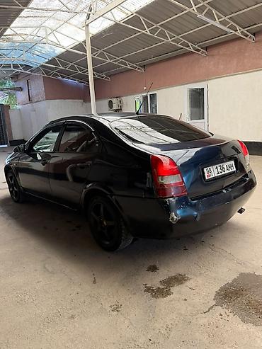 авто для такси: Nissan Almera: 2003 г., Механика — 4