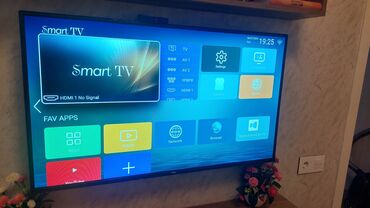 Kompüter, noutbuk və planşetlər: Televizor tecili satilir.Otaq balacadi televizor boyuk oldugu ucun