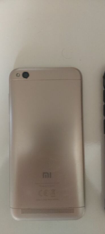 2 ci əl telefonlar redmi: Xiaomi Redmi 5A, 16 GB, rəng - Qızılı, 
 İki sim kartlı
