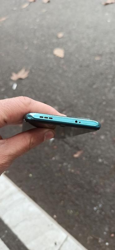 en yaxsi modem hansidir: Xiaomi 128 GB, rəng - Yaşıl, 
 Barmaq izi — 10