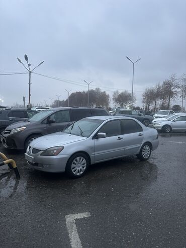 Mitsubishi: Mitsubishi Lancer: 2004 г., 1.6 л, Механика, Бензин, Седан — 10