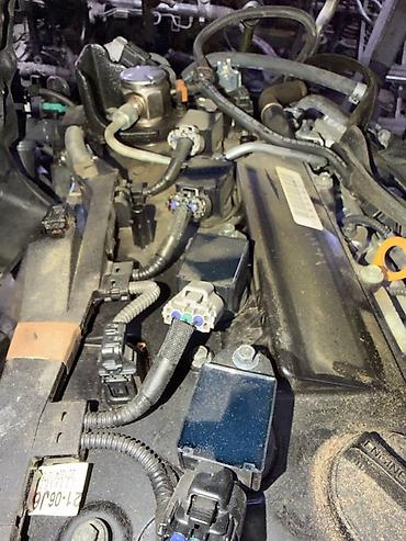 a25a: Катушка зажигания для Toyota Camry XV70, двигатель A25A-FKS, год 2021 — 1