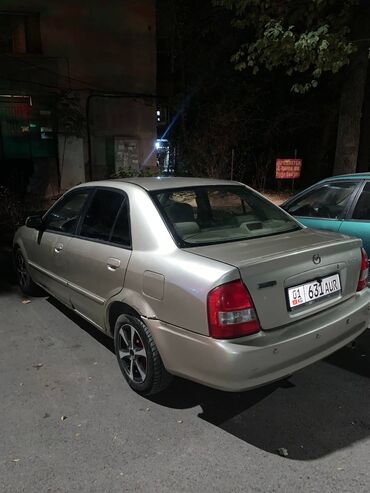 Mazda: Mazda 323: 1999 г.