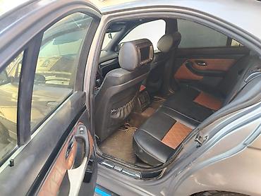 opel vectra b: BMW 5 series: 2.8 l | 1997 il Sedan — 5