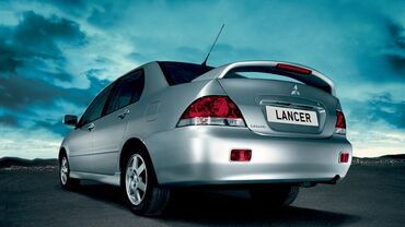 русификация авто: Задний Бампер Mitsubishi 2005 г., Новый, цвет - Черный, Аналог
