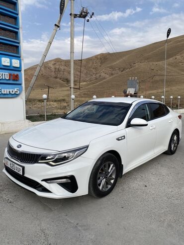 сколько стоит тормозные колодки: Белый седан Kia к5 с динамичным дизайном и плавными линиями кузова