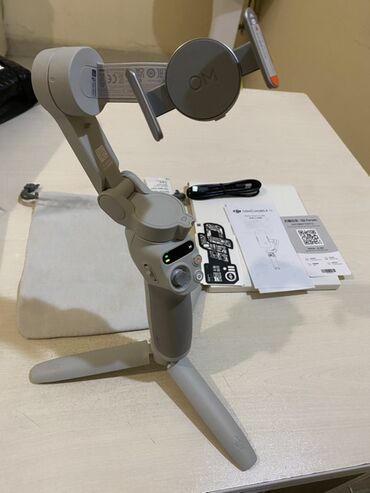 Telefon üçün stabilizatorlar: DJI Osmo Mobile SE – smartfonlar üçün 3 oxlu stabilizator — 4