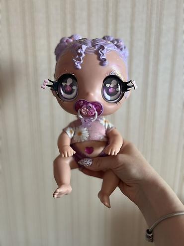 baby kukla: Kukla Glitter Babyz Lila MGA. Bu cazibədar kuklaların parlaq saçları — 2