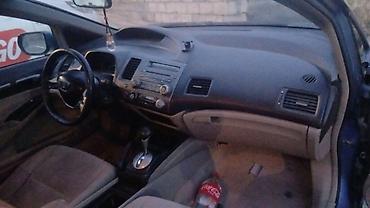 04 maşın: Honda Civic: 1.3 l | 2009 il Sedan — 6