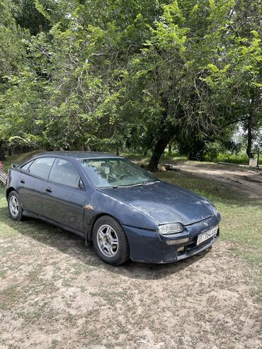 стоп на gx: Mazda 323: 1997 г., 1.5 л, Механика, Бензин, Седан