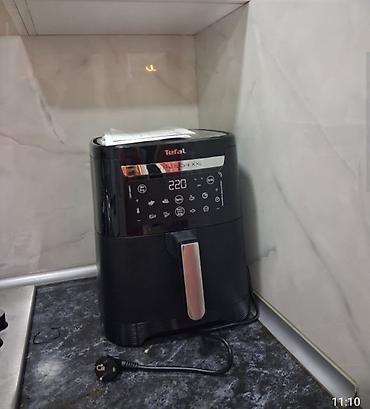 tefal caydan: - Qonaq otağı üçün şkaf: Açıq ağac tonlarında, çoxbölməli dizayn — 4