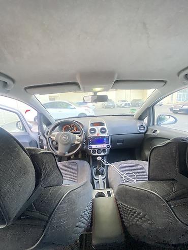 Opel: Opel Corsa CDTI, gümüşü rəng, 5 qapılı hetçbek. Texniki — 8