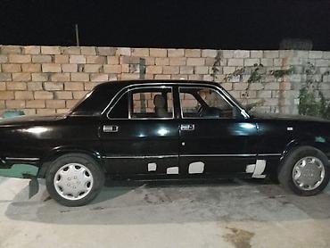 QAZ: GAZ Volga sedan – qara rəng Xüsusiyyətlər: - Kuzov: 4 qapılı sedan - — 5