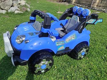 yeni doğulmuş uşaq paltarları: Uşaq elektrik maşını – off-road tipli, mavi rəng Xüsusiyyətlər:👉İkinci — 3
