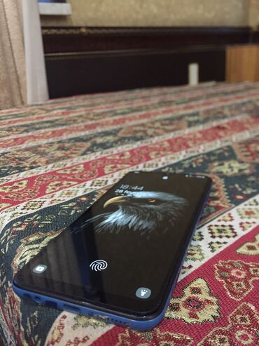 telefon ekrani: Samsung A50, 64 GB, rəng - Mavi, Zəmanət, Barmaq izi, İki sim kartlı