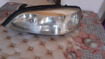 Faralar: Sol, Yaxın və uzaq vuran işıqlar Opel — 5