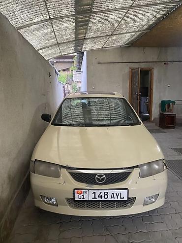 Mazda 323: 1995 г., 1.6 л, Автомат, Бензин, Седан