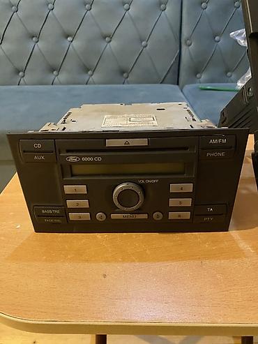 Магнитолы: Ford Audio Systems “6000 CD” avtomobil maqnitofonu və ön konsol — 1
