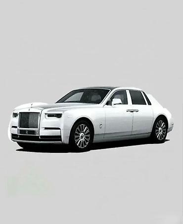 broj 22: Rolls royce phantom beli sa svetlećim farovima. rolls royce phantom — 1