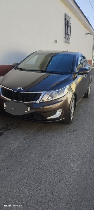 Kia: Kia Rio sedan - Korpus: 4 qapılı sedan, tünd qəhvəyi rəng - Kuzov — 2