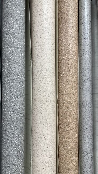 Линолеум: Рулон линолеума с мелкодисперсным узором. Представлен в нескольких — 5