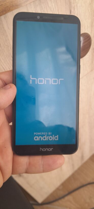 telefonlar 2ci el: Honor 7C, 32 GB, rəng - Qara, Düyməli, Barmaq izi, Face ID