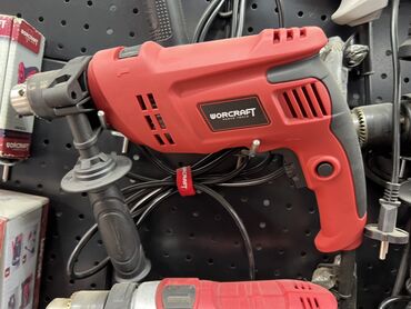 флипчарты меловая с дополнительными планками: Ударная дрель Worcraft красного цвета с черными вставками. Имеет