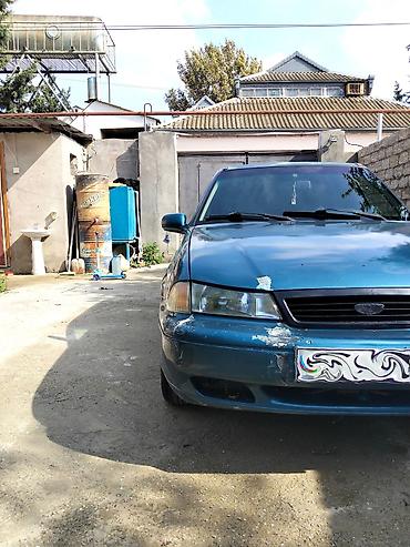 ceri masin: Daewoo Nexia: 1.5 l | 2001 il — 4
