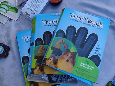 mali cupavi psi: True Touch rukavica sa pet prstiju dizajnirana je za efikasno — 1