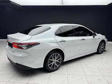 kamri 75: Toyota Camry: 2023 г., 2.5 л, Автомат, Гибрид, Седан — 4