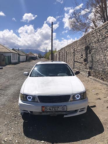 Передние фары: Передняя левая фара Nissan — 6