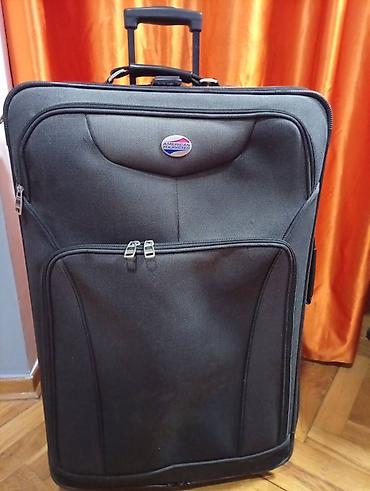 Putni koferi i torbe: Veliki kofer na točkiće – American Tourister. 75 45 30 - — 2