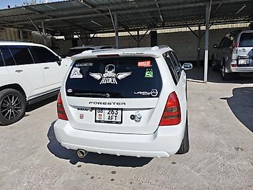 машина номер аукцион: Subaru Forester: 2002 г., 2 л, Автомат, Газ, Универсал — 6