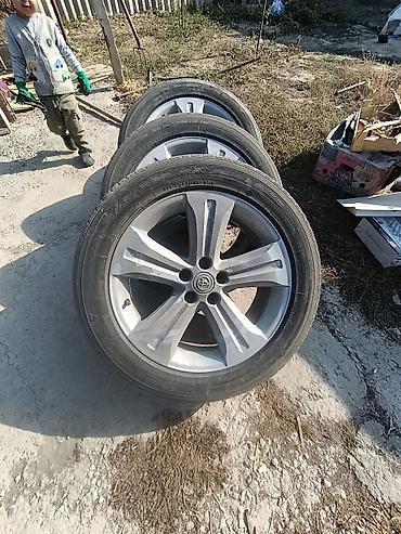 колпачки: Комплект колёс Toyota в сборе: оригинальные литые диски с шинами — 3