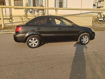 volkswagen passat 1: Kia Rio: 1.4 л | 2008 г. Седан — 2